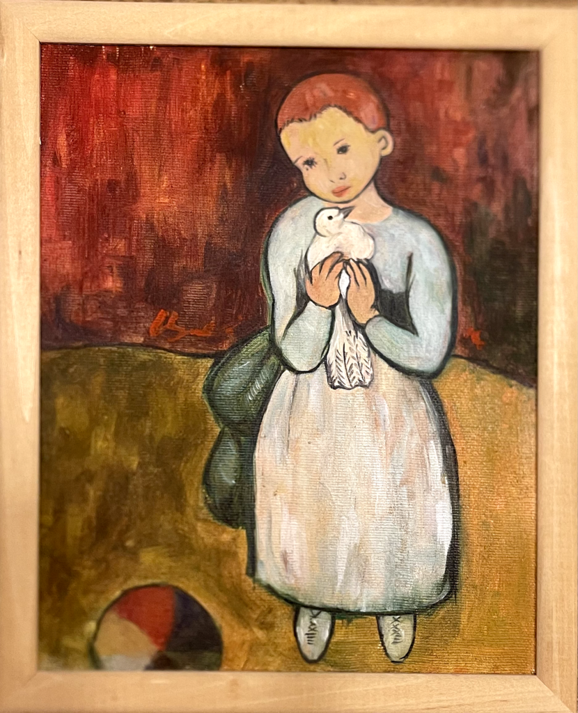 Devojcica drzi belog goluba u rukama